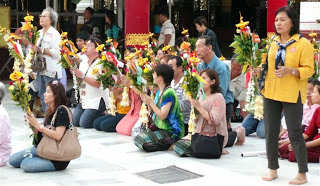 Saying Prayers At Schwedagon Paya