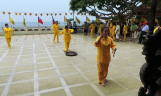Yellow suited temple dancers