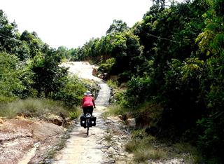 Riding_the_stick_road