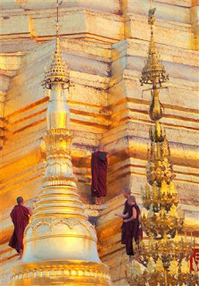 Monks Applying Gold Leaf to the Stupa