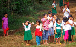 Schoolchildren waving