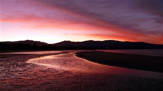 Sunset over Pohara Bay